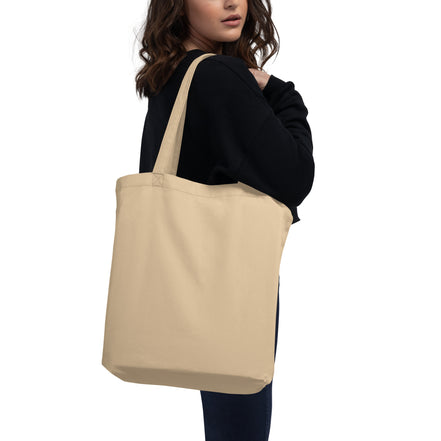 Beige Bio-Baumwolltasche mit schwarzem Rottweiler-Icon und Paul & Emma Logo - nachhaltige Tote Bag