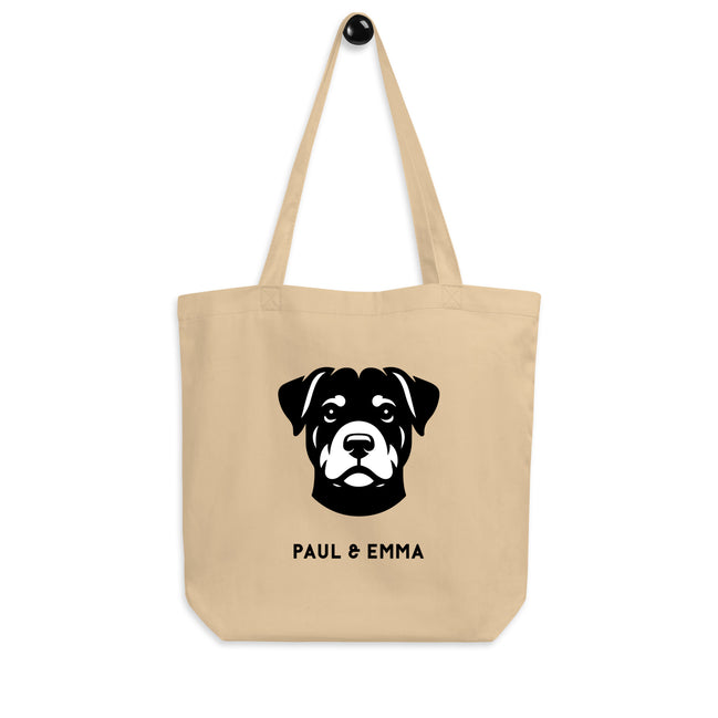 Beige Bio-Baumwolltasche mit schwarzem Rottweiler-Icon und Paul & Emma Logo - nachhaltige Tote Bag